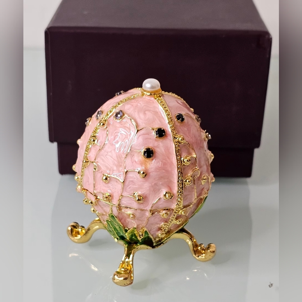 Elegant Pink and Gold Decorative Egg by [Brand]